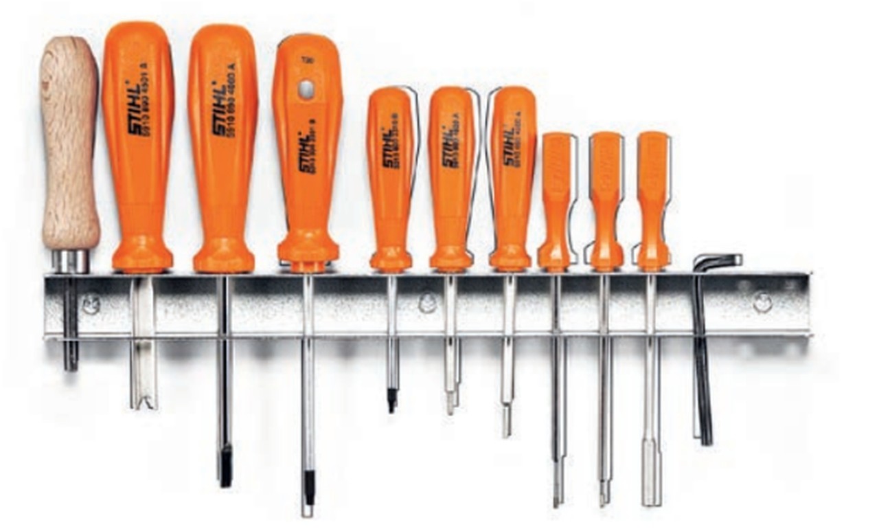 STIHL speciaal gereedschap naast elkaar in een houder